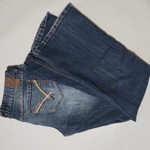 Vanity, midrise, size 28Wx 31L, flared leg, factory worn, embroidered pockets.